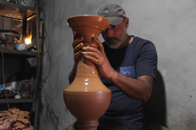 A skilled artisan in the south of Lebanon working on pieces for the restoration of the Sursock Palace in Beirut. 